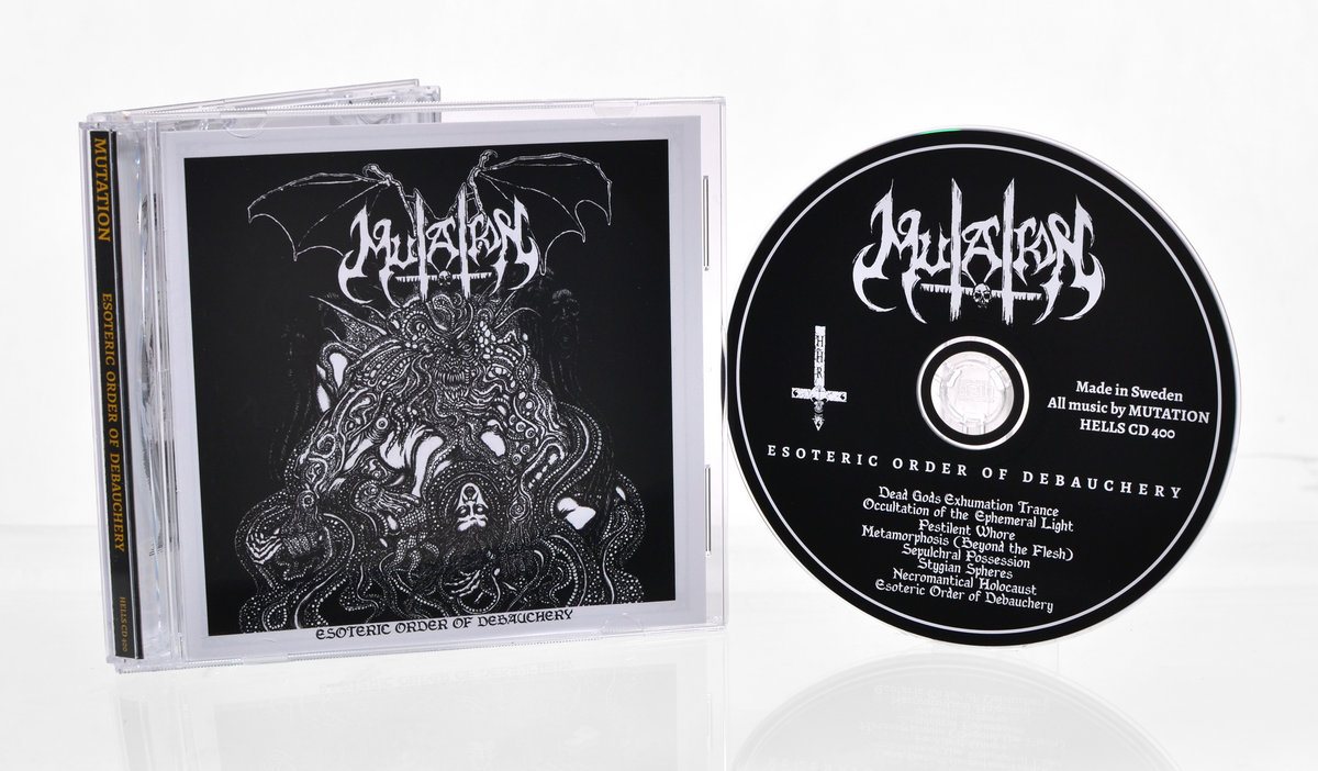 The CD: jewel case with the cover art, and the printed black disc